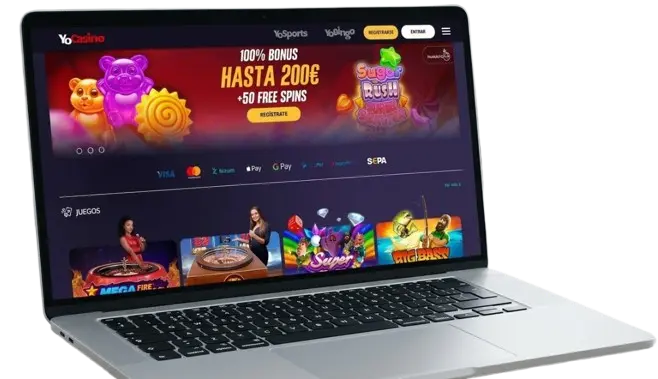 Portátil mostrando sitio web de YoCasino con bono 'HASTA 200€' en escritorio, ilustrando plataforma de juegos